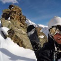 Russia, Caucasus, Elbrus region. Valley Medvezhie ridge. Rider Konstantin Galat at the couloir start-point. Selfie Russia, Caucasus, Elbrus region. Valley Medvezhie ridge. Rider Konstantin Galat at the couloir start-point. Selfie