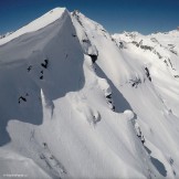 Russia, Caucasus, Elbrus region. Mt.Cheget north slopes. Rider - Aleksander Ilyin. Photo by Oleg Kolmovskiy (drone)